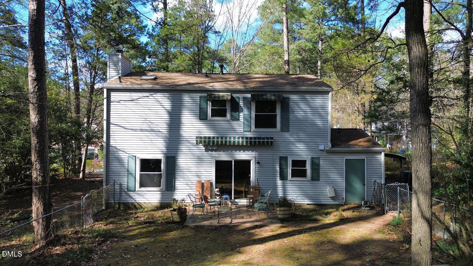 315 Hemming Way Durham, NC 27713 - Photo 3 of 21 a view of a house with backyard and chairs