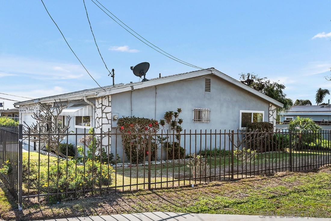 1212 South 36th Street San Diego, CA 92113 - Photo 1 of 33 a front view of a house with a porch