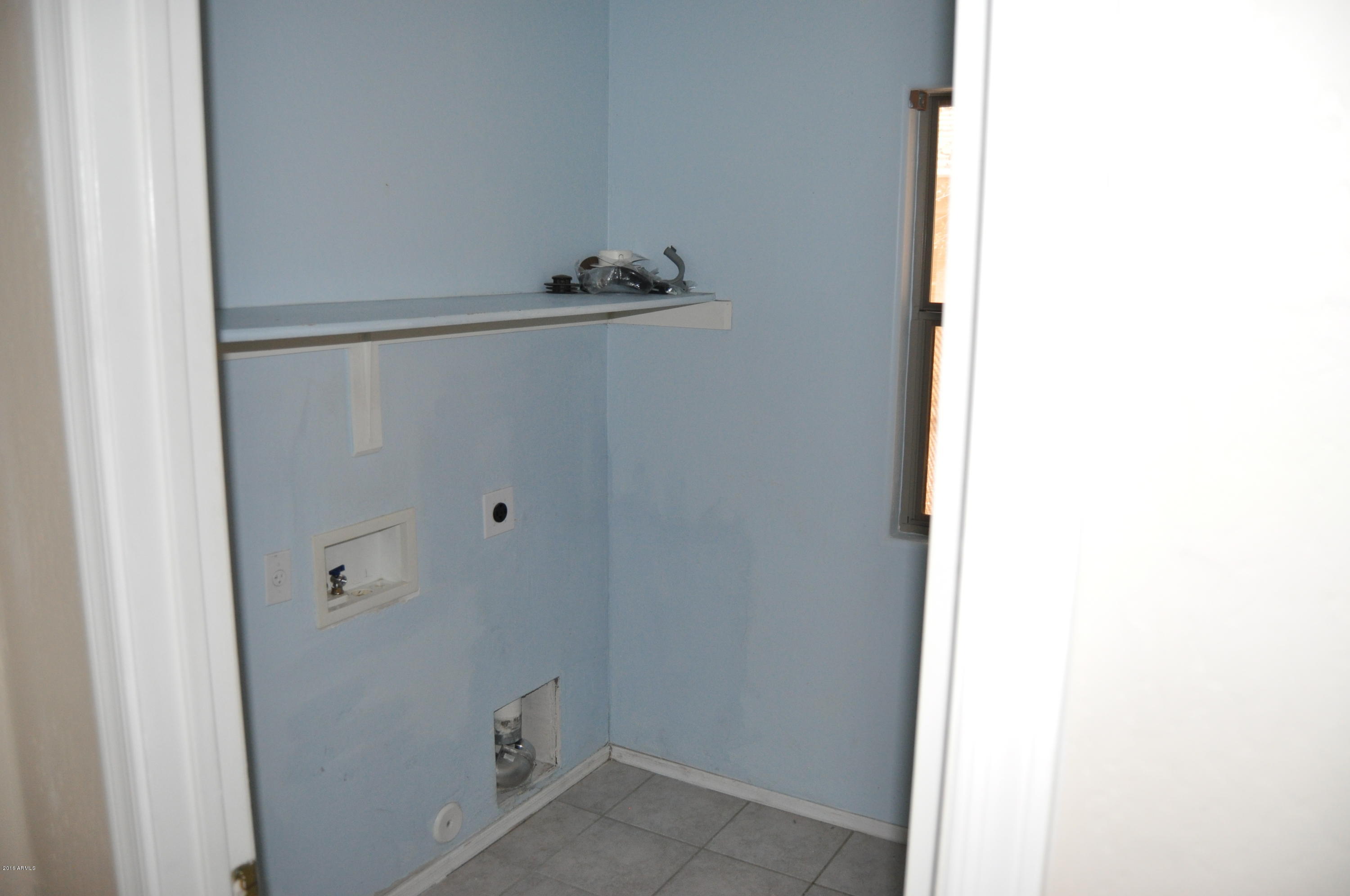 2082 West Tanner Ranch Road Queen Creek, AZ 85144 - Photo 5 of 33 Laundry room