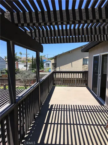 a view of barbeque grill with wooden floor