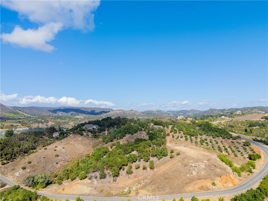 23476 La Vella Road Temecula, CA 92590 - Photo 12 of 29 a view of a lake with mountains in the background