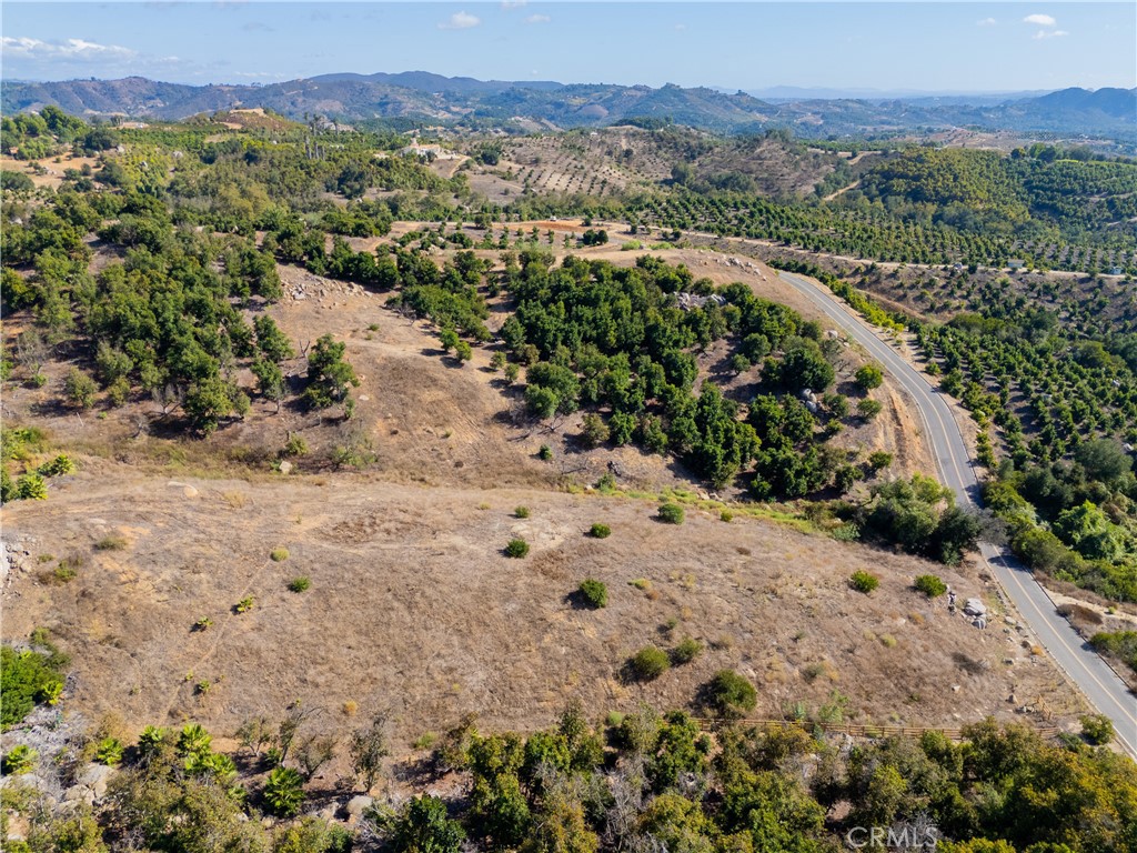 23476 La Vella Road Temecula, CA 92590 - Photo 13 of 29 a view of a lake with mountains in the background