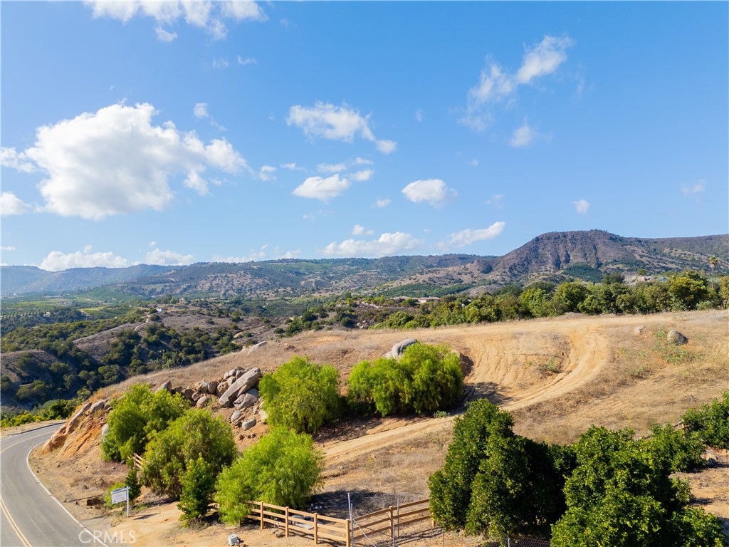 23476 La Vella Road Temecula, CA 92590 - Photo 17 of 29 a view of a lake with mountains in the background
