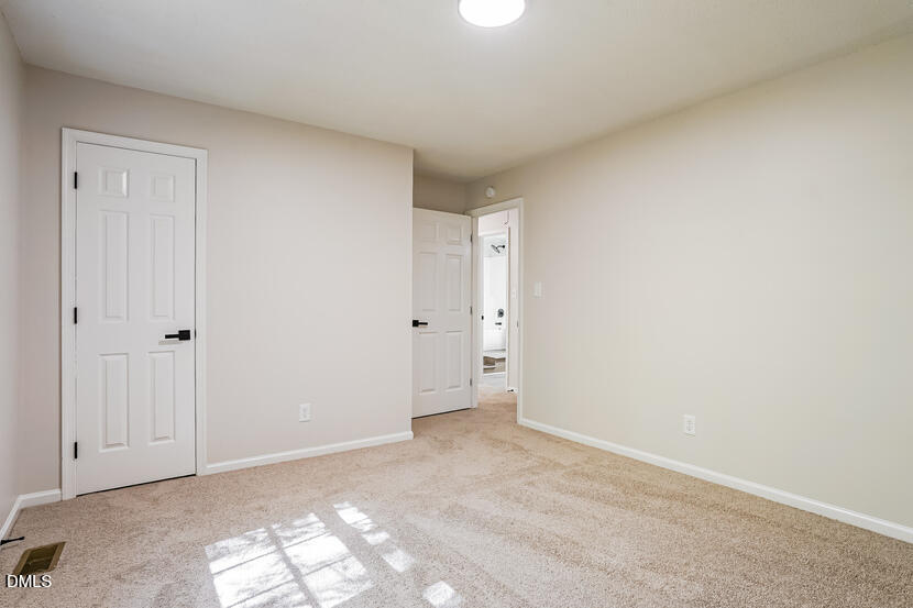 5308 Amsterdam Place Raleigh, NC 27606 - Photo 11 of 20 010-photo-main-bedroom-14885360