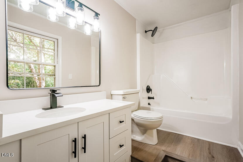 5308 Amsterdam Place Raleigh, NC 27606 - Photo 12 of 20 011-photo-main-bathroom-14885440