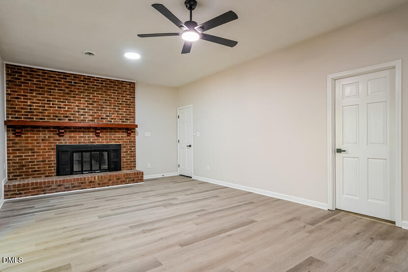 5308 Amsterdam Place Raleigh, NC 27606 - Photo 2 of 20 001-photo-living-room-14885333
