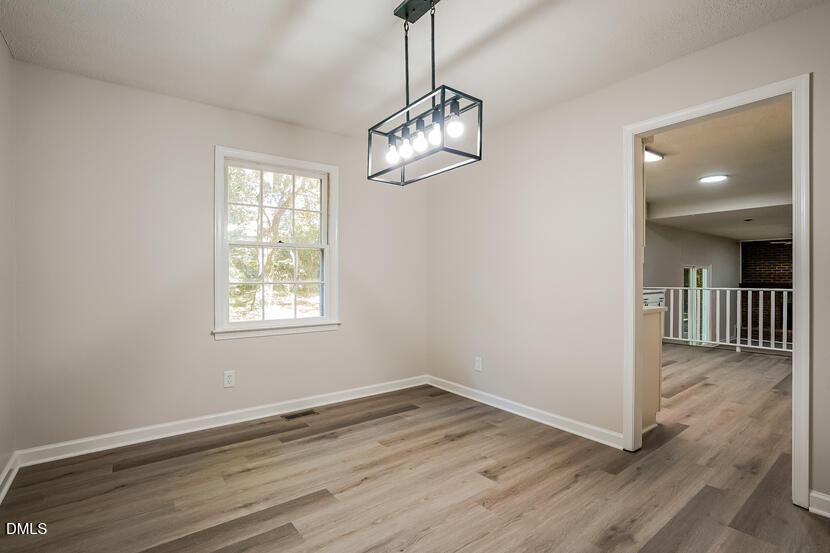 5308 Amsterdam Place Raleigh, NC 27606 - Photo 4 of 20 003-photo-dining-room-14885339
