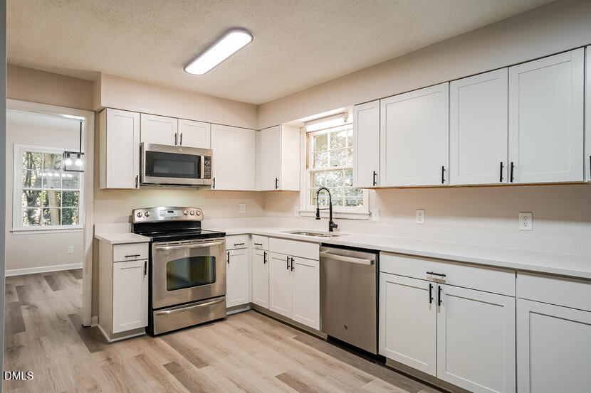 5308 Amsterdam Place Raleigh, NC 27606 - Photo 6 of 20 005-photo-kitchen-14885345