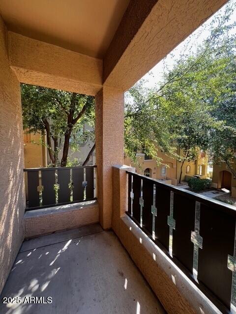 16825 North 14th Street, Unit 49 Phoenix, AZ 85022 - Photo 20 of 21 a view of a green field with wooden fence