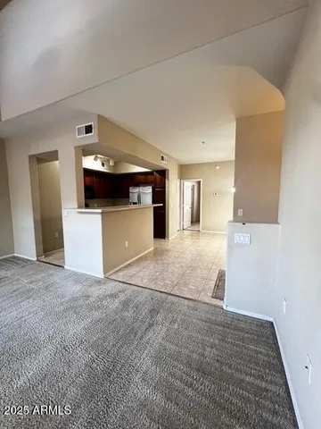 a view of a kitchen cabinets and a wooden floor