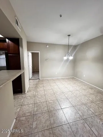a view of a kitchen with a sink and a stove top oven