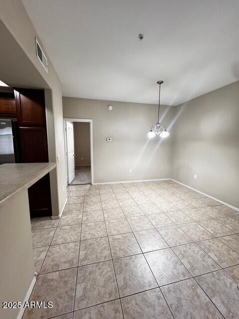 16825 North 14th Street, Unit 49 Phoenix, AZ 85022 - Photo 6 of 21 a view of a kitchen with a sink and a stove top oven