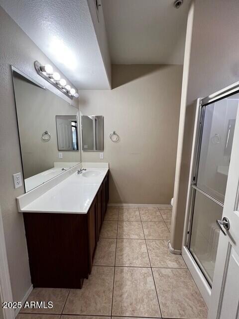 16825 North 14th Street, Unit 49 Phoenix, AZ 85022 - Photo 9 of 21 a bathroom with a sink a mirror and a toilet