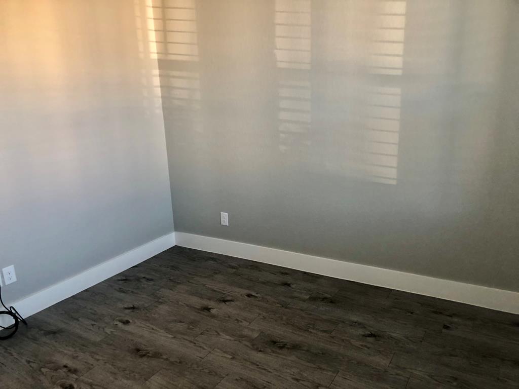 229 Riley Lane Fredericksburg, TX 78624 - Photo 10 of 16 a view of a small space with wooden floor and a window