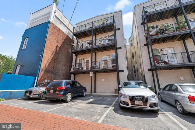 a car parked in front of a building