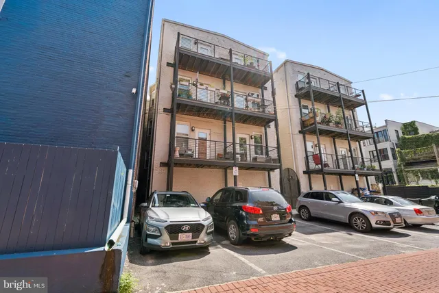 a car parked in front of a building