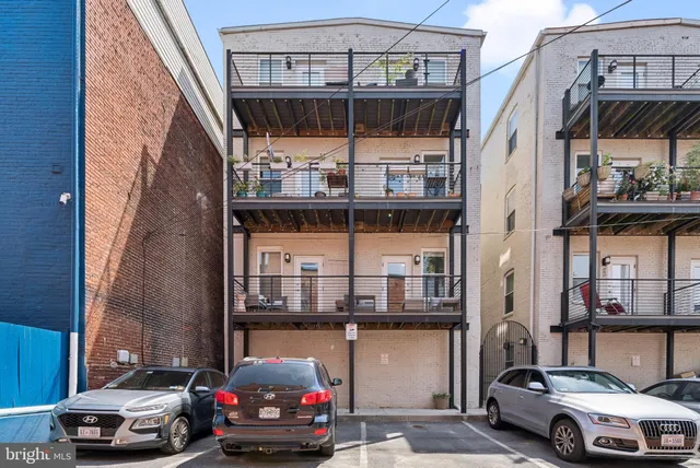 a car parked in front of a building