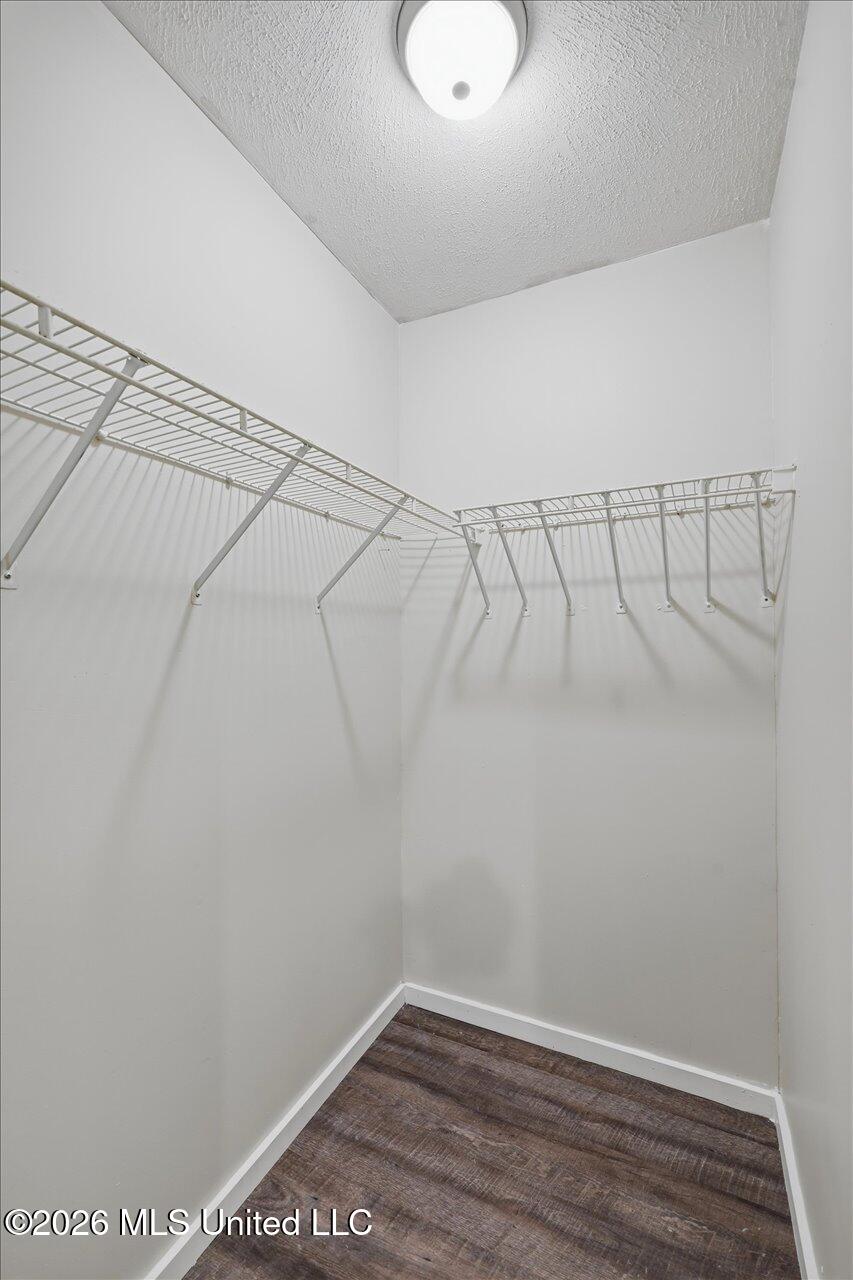 301 Maple Street Florence, MS 39073 - Photo 19 of 30 Master Wall In Closet