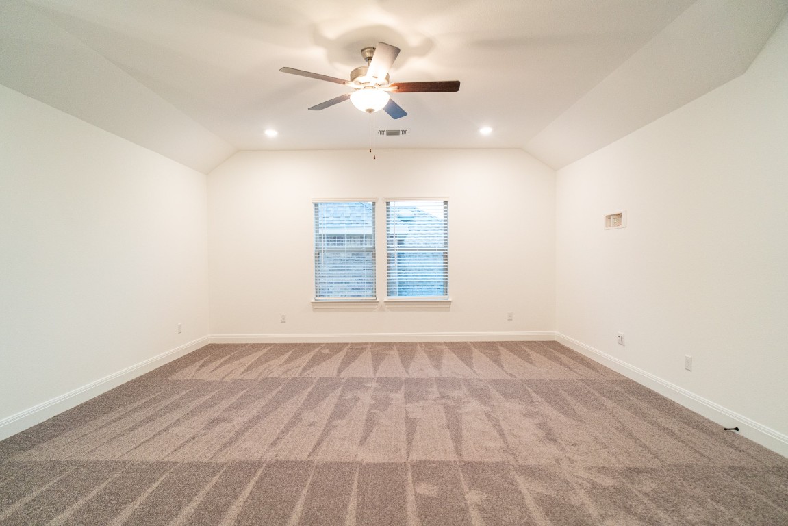 3501 Jaulan Street Leander, TX 78641 - Photo 16 of 22 wooden floor in an empty room with a window