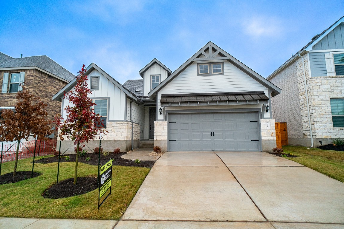 3501 Jaulan Street Leander, TX 78641 - Photo 2 of 22 a front view of a house with a yard