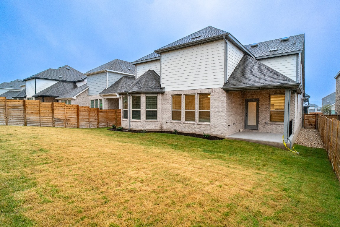 3501 Jaulan Street Leander, TX 78641 - Photo 22 of 22 a view of a house with a swimming pool