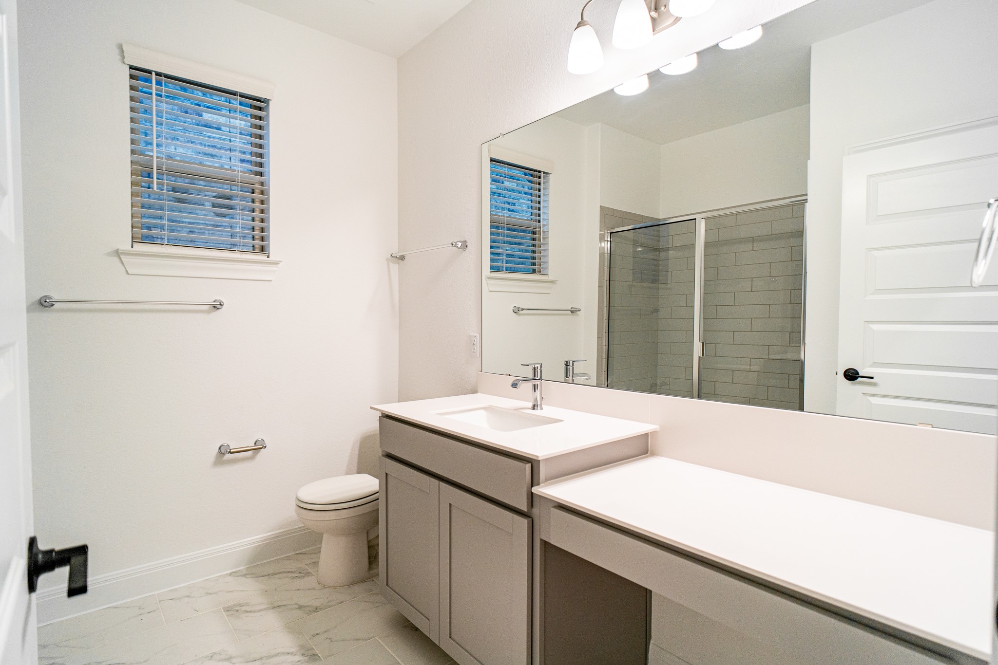 3501 Jaulan Street Leander, TX 78641 - Photo 27 of 33 Full bath featuring a shower stall, light marble finish flooring, and vanity