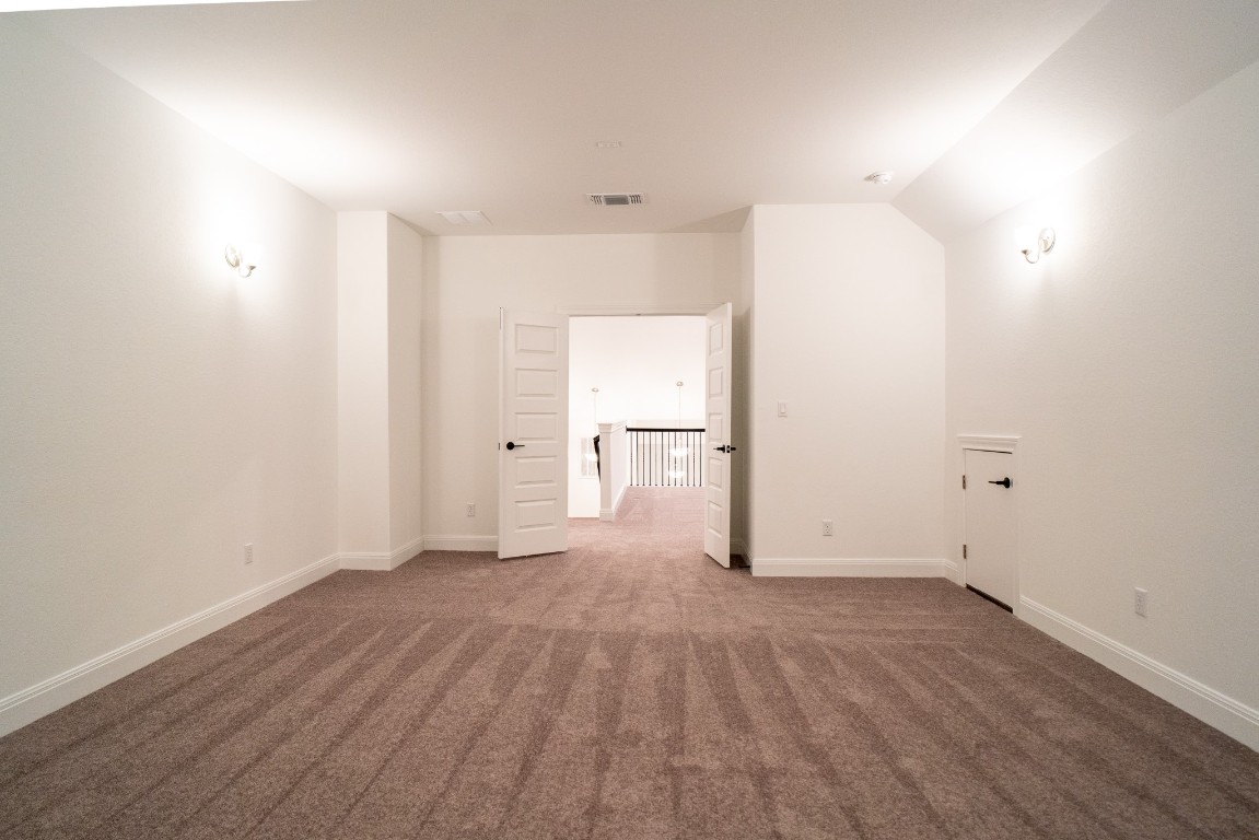 3501 Jaulan Street Leander, TX 78641 - Photo 4 of 22 a view of empty room with wooden floor