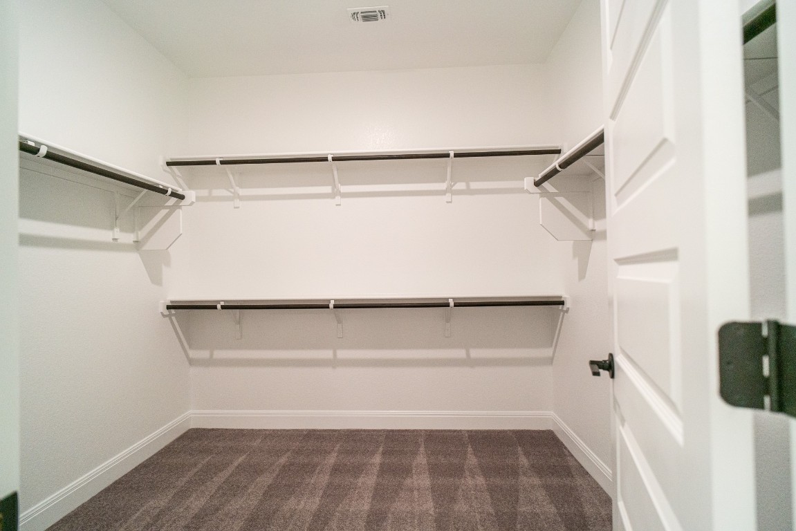3501 Jaulan Street Leander, TX 78641 - Photo 8 of 22 a view of an empty walk in closet