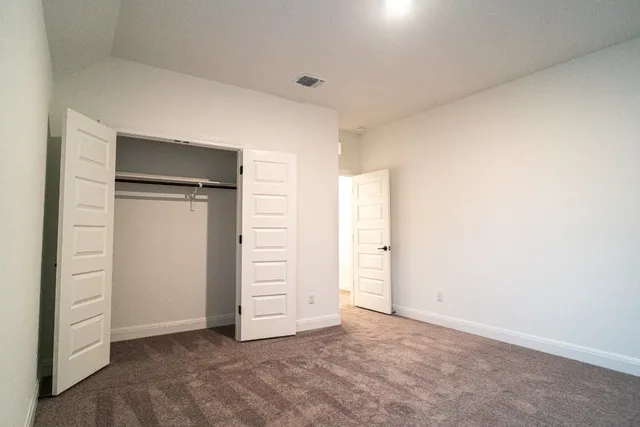 an empty room with closet