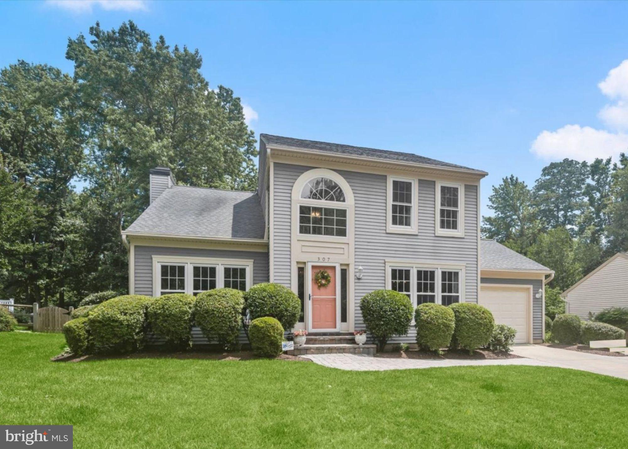 307 Carriage Run Road Annapolis, MD 21403 - Photo 1 of 52 a front view of a house with a yard