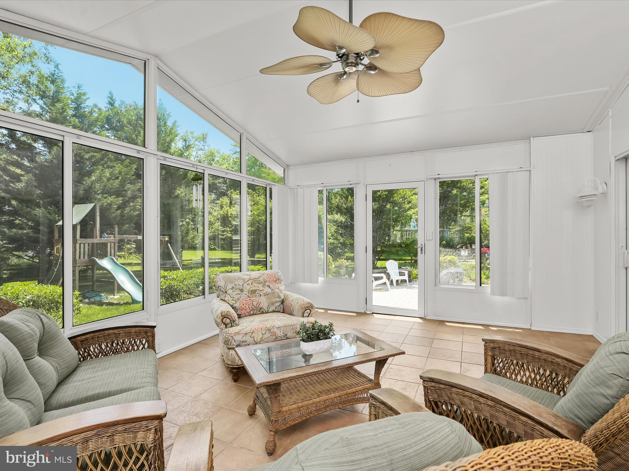 307 Carriage Run Road Annapolis, MD 21403 - Photo 26 of 52 a living room with furniture and a large window with garden view