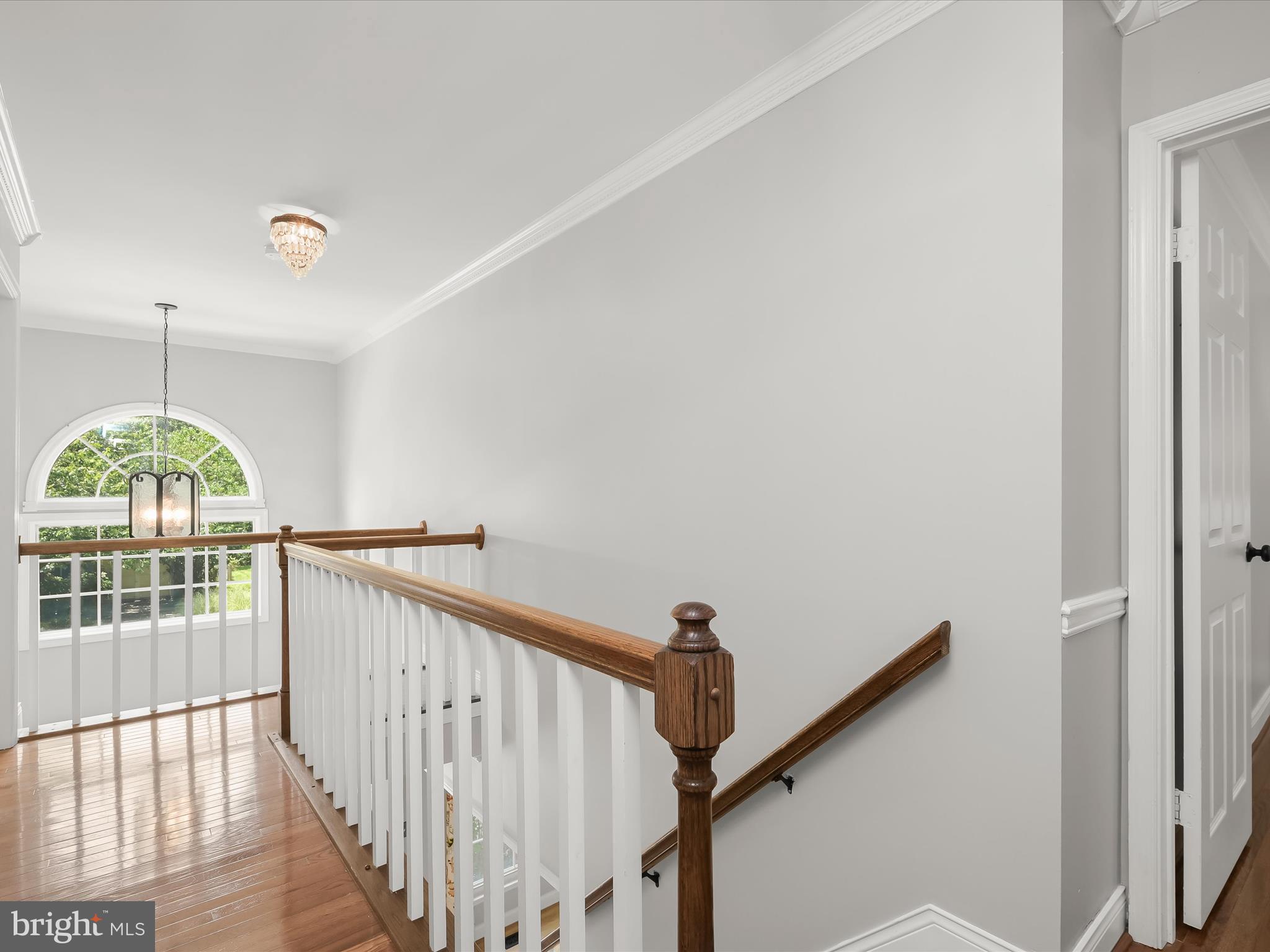 307 Carriage Run Road Annapolis, MD 21403 - Photo 32 of 52 a view of a hallway with windows