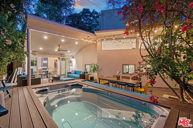 a view of a swimming pool with a patio