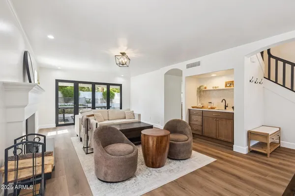 a living room with furniture and a window