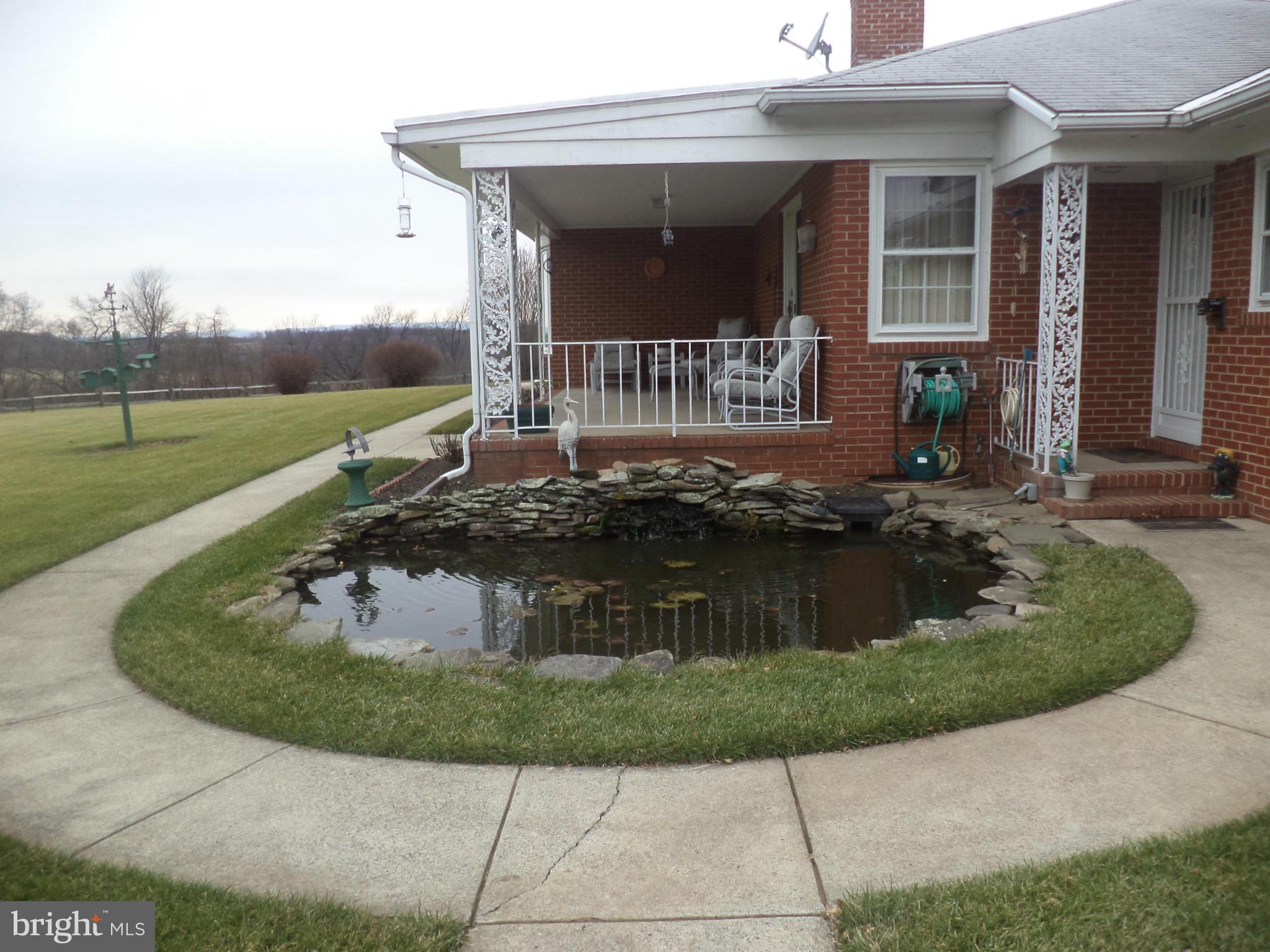 14729 Shirley Bohn Road Mount Airy, MD 21771 - Photo 15 of 21 a view of a house with a yard potted plants
