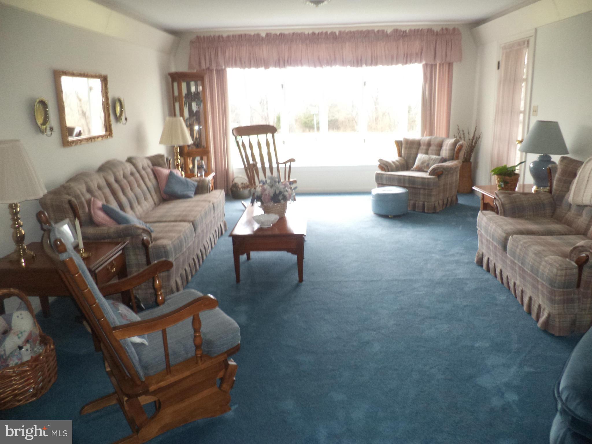 14729 Shirley Bohn Road Mount Airy, MD 21771 - Photo 9 of 21 a living room with furniture and a large window