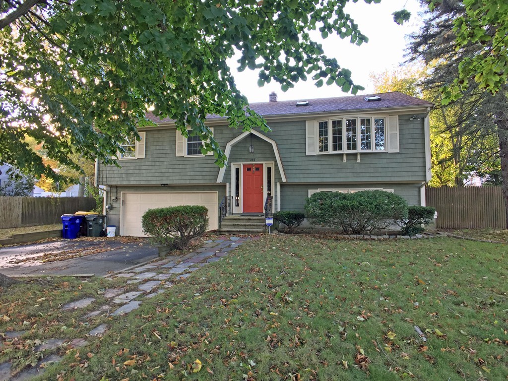 353 Renaud Street Fall River, MA 02721 - Photo 1 of 21 a view of a house with a yard and sitting area