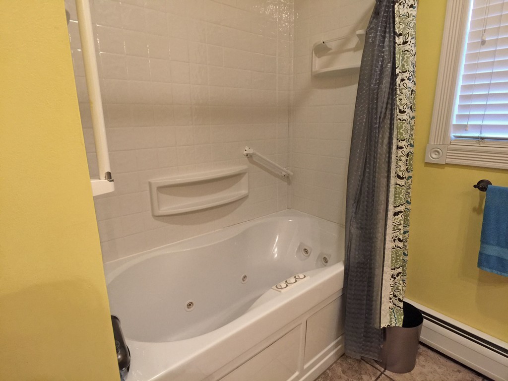 353 Renaud Street Fall River, MA 02721 - Photo 14 of 21 a bathroom with a bathtub