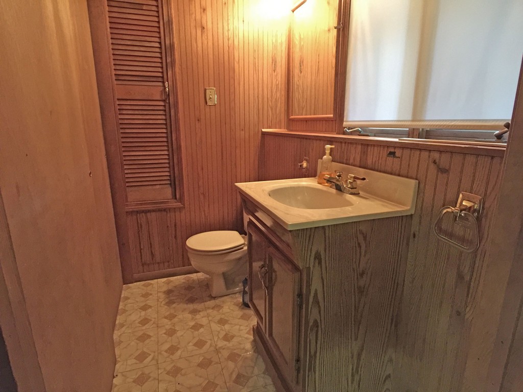 353 Renaud Street Fall River, MA 02721 - Photo 20 of 21 a bathroom with a sink a toilet and shower