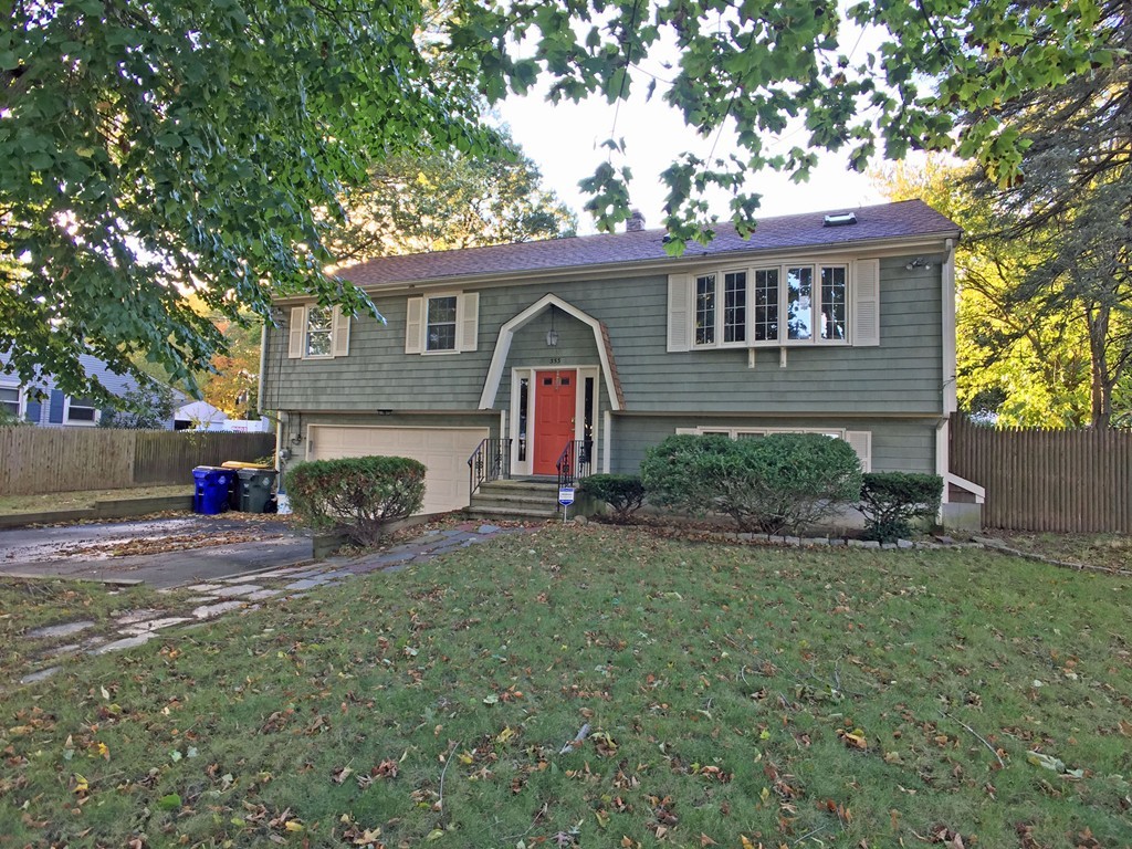 353 Renaud Street Fall River, MA 02721 - Photo 21 of 21 a front view of a house with garden
