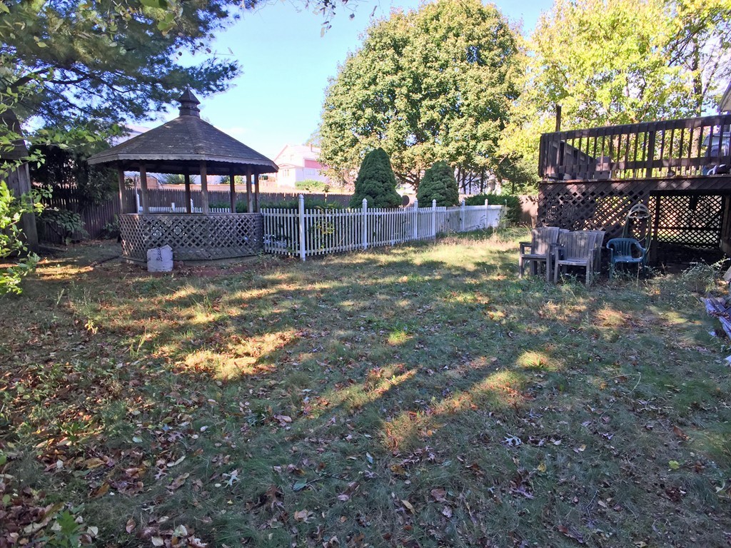 353 Renaud Street Fall River, MA 02721 - Photo 5 of 21 a view of a house with backyard and sitting area