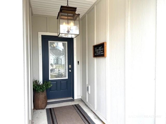 485 Shepard Street Gulf Shores, AL 36542 - Photo 6 of 53 View of exterior entry with covered porch