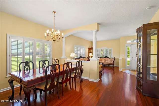 a view of a room with a large window