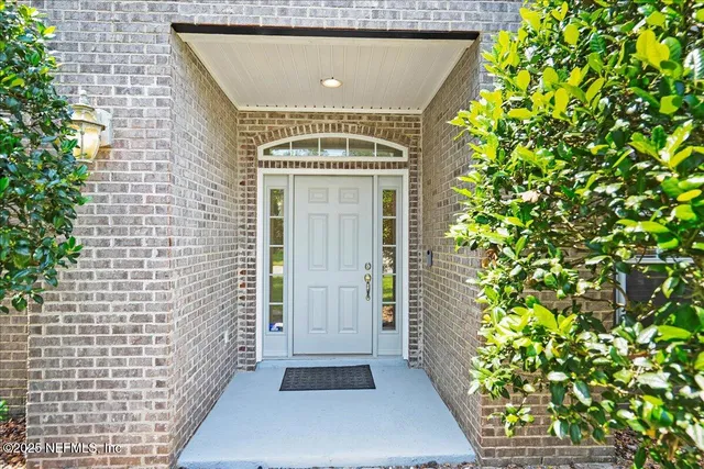 a bedroom with furniture and wooden floor