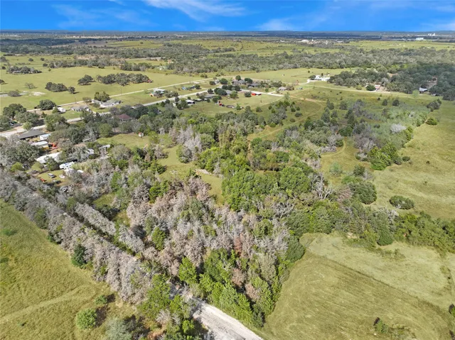 an aerial view of beach and city