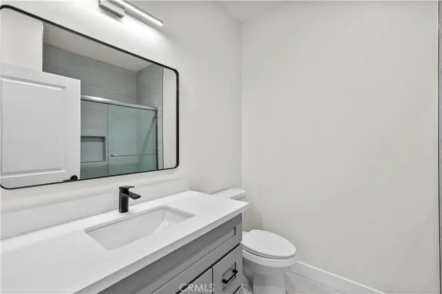 a bathroom with a sink and a toilet