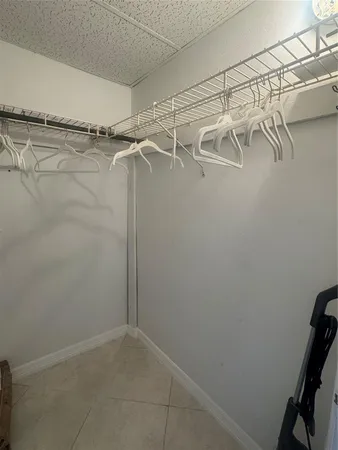 a view of a room with racks on the wall