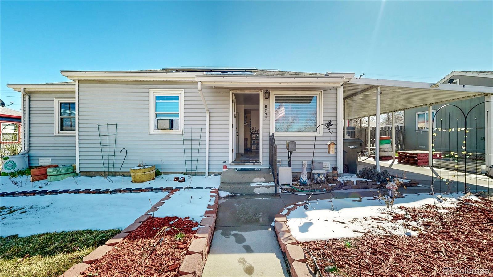 1960 Rowena Street Thornton, CO 80229 - Photo 27 of 48 swimming pool view with a outdoor seating