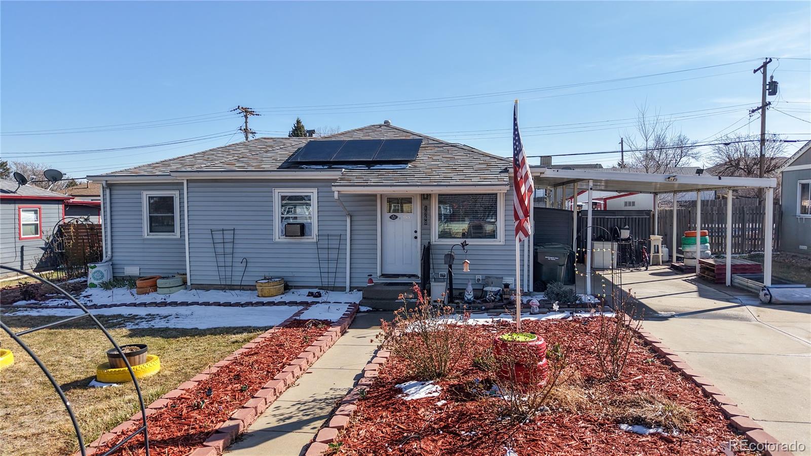 1960 Rowena Street Thornton, CO 80229 - Photo 35 of 48 a view of house with outdoor space