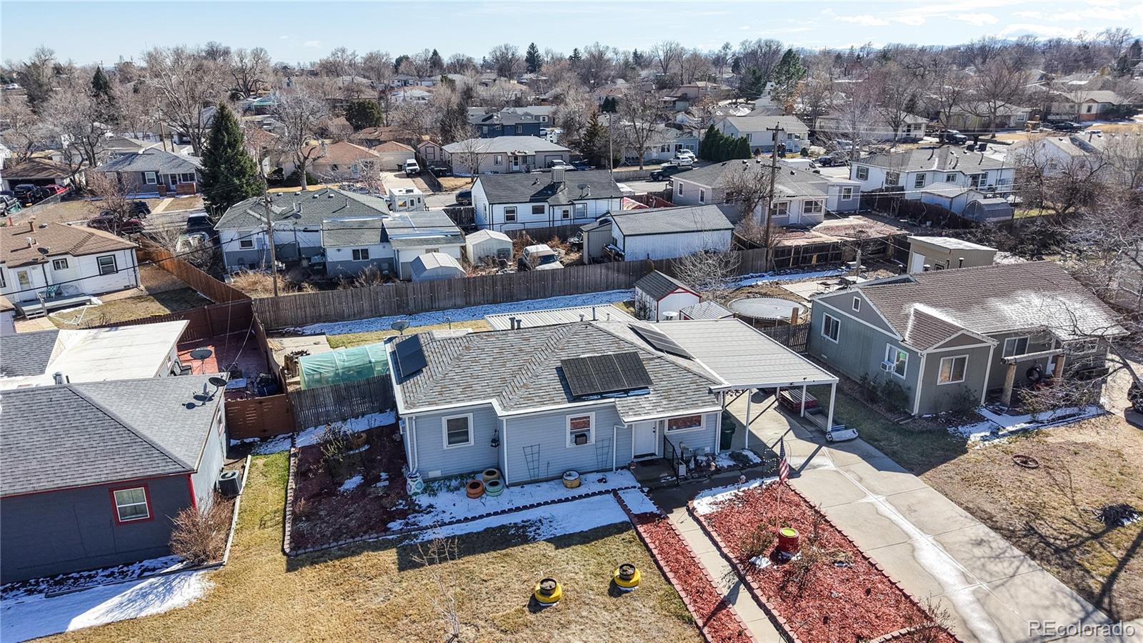 1960 Rowena Street Thornton, CO 80229 - Photo 41 of 48 an aerial view of a house with a big yard